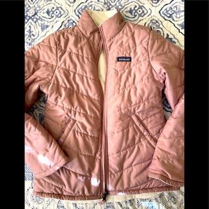 Patagonia reversible jacket with pockets on both sides fits size 10-11 girls.